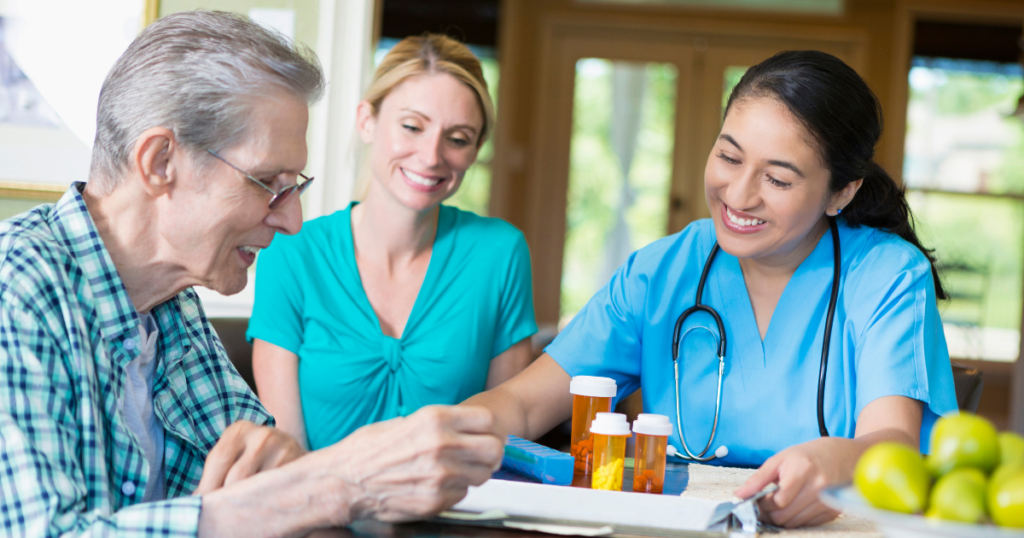 Elderly man receiving assistance from a nurse and a caregiver in a care home.